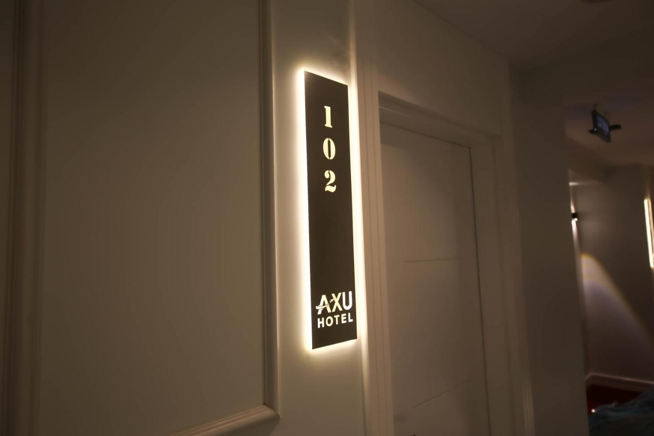 Axu Airport Hotel Arnavutkoy Exteriér fotografie A room number sign