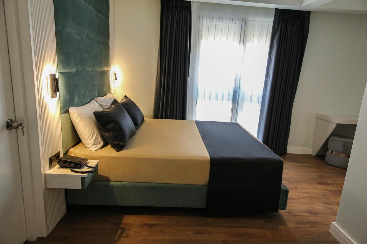Axu Airport Hotel Arnavutkoy Exteriér fotografie A bedroom at the hotel